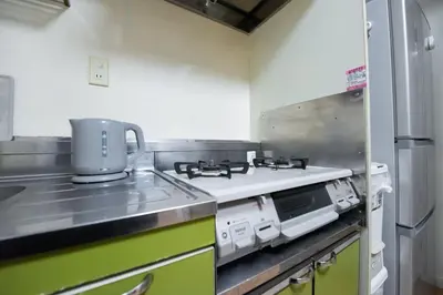 a kitchen with a stove top oven in a kitchen at Ikebukuro\u4e2d\u5ddd405-TS0041 in Tokyo