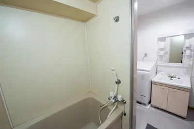 a bathroom with a bath tub and a sink at Ikebukuro\u4e2d\u5ddd405-TS0041 in Tokyo