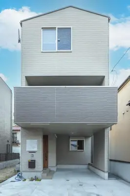 a house with a window on the side of it at Skytree House Oshiage New 3-story Villa, 2 Showers, 2 Toilets, 4 Rooms, 3 min walk to Oshiage Station in Tokyo
