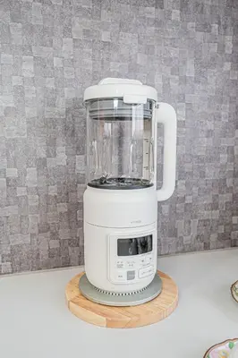a white blender sitting on a stand on a counter at KTV Party House 3min to Itabashi Station Traditional Street Stay in Tokyo