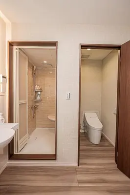 a bathroom with a shower and a toilet and a sink at KTV Party House 3min to Itabashi Station Traditional Street Stay in Tokyo