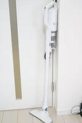 a white iv stand in the corner of a room at Tower View Stay Kinchicho in Tokyo