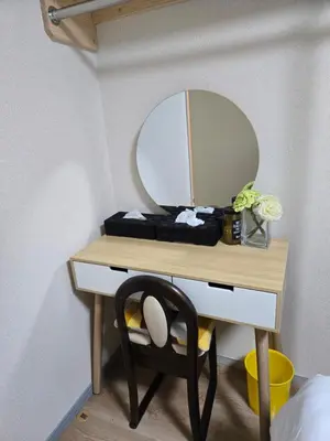a dressing table with a mirror and a chair at BandK Numabukuro 202 in Tokyo