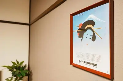 a picture of a poster on a wall at Monthly Only Kotori Hinoki Ideal Place for Long-term Stay and Workcation in Tokyo