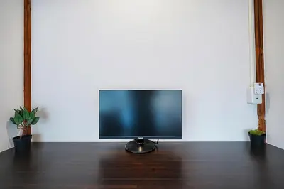 a flat screen tv sitting on top of a wooden floor at Monthly Only Kotori Hinoki Ideal Place for Long-term Stay and Workcation in Tokyo