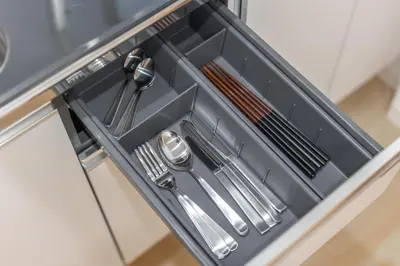 a plastic drawer with utensils in a kitchen at TaroTime Shinjuku Serene Japanese Cottage in Tokyo