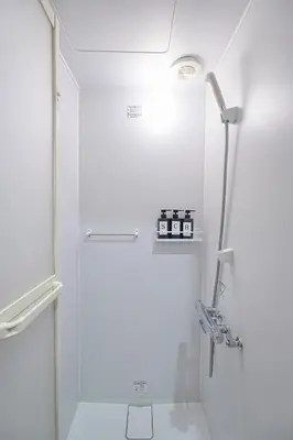 a white bathroom with a shower and a toilet at Monthly Only Kotori Akasaka Ideal Place for Long-term Stay and Workcation in Tokyo