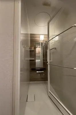 a bathroom with a shower with a glass door at AHAI \u30db\u30c6\u30eb2 - Tokyo Private VILLA in Tokyo