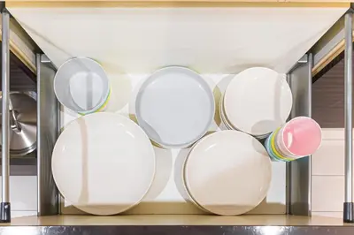 a shelf with white mirrors in a kitchen at STARRY STAY HOUSE SHIBUYA I - Vacation STAY 65376v in Tokyo