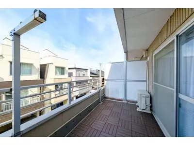 an empty balcony of a building with a view of a building at Living Stay Plum Residence - Vacation STAY 20585 in Tokyo