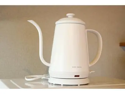 a white electric tea kettle sitting on a counter at Living Stay Plum Residence - Vacation STAY 20586 in Tokyo