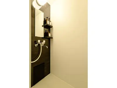 a bathroom with a shower with a sink at Living Stay Plum Residence - Vacation STAY 20586 in Tokyo