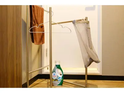 a room with a mirror and a bottle on the floor at Living Stay Plum Residence - Vacation STAY 20586 in Tokyo