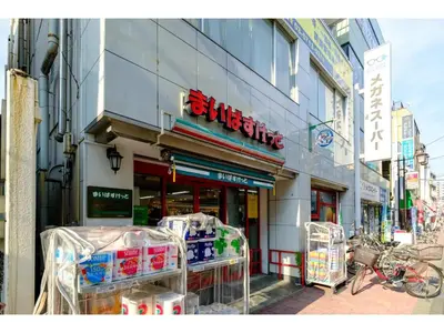 a store with shopping carts in front of a building at Living Stay Plum Residence - Vacation STAY 20584 in Tokyo