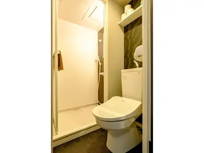 a bathroom with a toilet and a shower at Living Stay Plum Residence - Vacation STAY 20584 in Tokyo