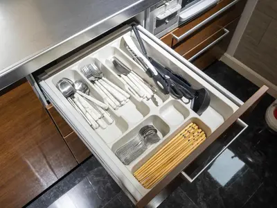 a drawer filled with utensils in a kitchen at Familia Heiwajima 2 in Tokyo