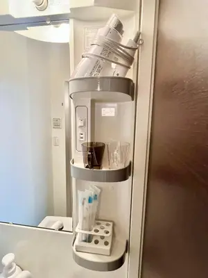 a refrigerator with a coffee maker in a room at \u5357\u516c\u5712\u30b9\u30ab\u30a4\u30d3\u30e5\u30fc in Tokyo
