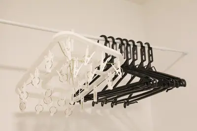 a white chandelier hanging from a ceiling at Comore Villa 1F in Tokyo