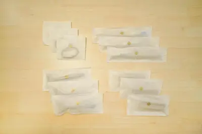 a group of white napkins on a wooden table at LinksHotel\u4e0a\u91ce in Tokyo