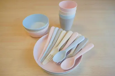 a plate with utensils and a cup on a table at LinksHotel\u4e0a\u91ce in Tokyo