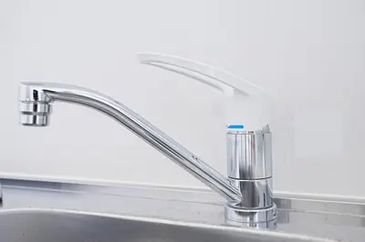 a sink with a faucet with a toothbrush at Vivere in Tokyo