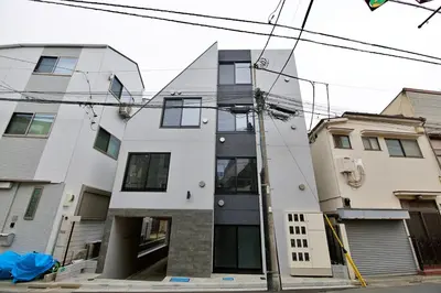 a building on a city street with at 1 stop to Ikebukuro 3 min walk from station in Tokyo