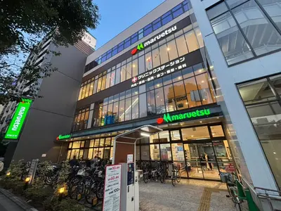 a building with bikes parked in front of it at PRISM Inn Kagurazaka in Tokyo