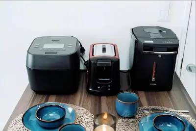 a toaster and a printer sitting on a table at Nine Lane Omori in Tokyo