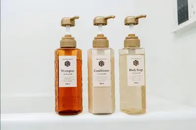 a group of three bottles sitting next to each other at Nine Lane Omori in Tokyo