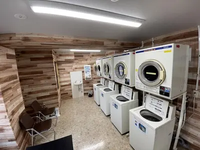 a laundry room with several washing machines and washers at CraftFlat Komagome 508, a compact studio at excellent location in Tokyo