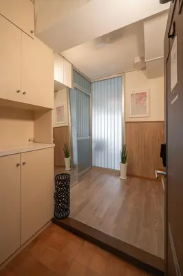 an empty room with a kitchen and a living room at 15 min Ikebukuro Tokyo 2-BR Apartment in Tokyo