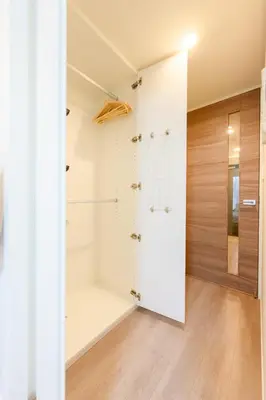 a bathroom with a walk in shower next to a closet at アルファサイト御茶ノ水 - Historic Ochanomizu Stay - Near Akihabara & Imperial Palace - JR & Subway Access in Tokyo