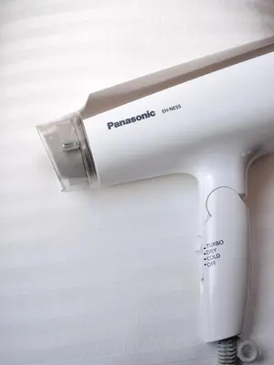 a close up of a white shower head at Hagi in Tokyo
