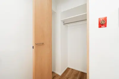 a room with a closet with a door at Shinjuku Center Apart ment in Tokyo