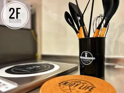 a container of kitchen utensils sitting on a counter at 磐-Comfortable Home with 2BR-Sleeps 6 in Kagurazaka Near Yayoi Kusama Museum , Tokyo Dome , Sakura Lovers' Choice-Kanda River in Tokyo