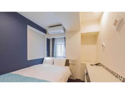 a small room with a bed and a window at ASTA HOTEL - Vacation STAY 87206v in Tokyo