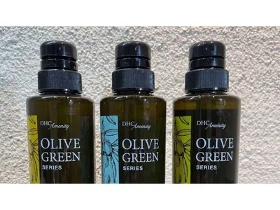 three bottles of olive green liquids sitting on a shelf at ASTA HOTEL - Vacation STAY 87210v in Tokyo