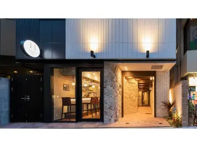 a building with a clock on the side of it at ASTA HOTEL - Vacation STAY 87287v in Tokyo