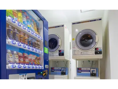 a washer and dryer in a room with machines at ASTA HOTEL - Vacation STAY 87298v in Tokyo