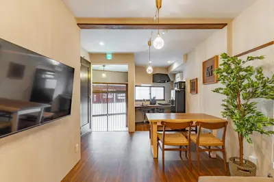 a dining room and kitchen with a table and chairs at \u548c\u6c17\u4f1a\u3005\u690e\u540d\u753a Wakiaiai Shiinamachi in Tokyo