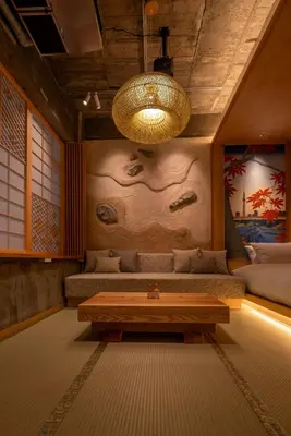 a living room with a couch and a chandelier at sumica\u6d45\u8349\u82b1\u9ce5 in Tokyo