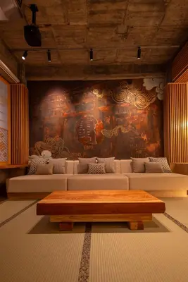 a room with couches and a wall with a painting at sumica\u98a8\u6708\u6d45\u8349 in Tokyo