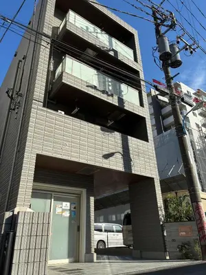 a building with a balcony on the side of it at monthly EveryNet SHINJUKU II in Tokyo