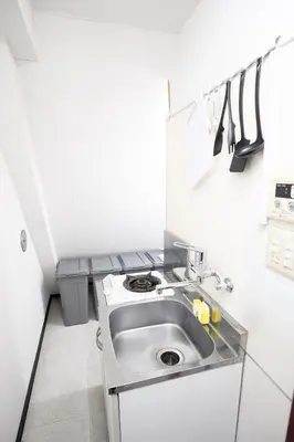 a small white kitchen with a sink in it at Perfect Tokyo Location-Gueat for Sightseeing,SIeeps up to8! in Tokyo