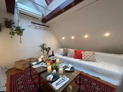 a living room with a couch and a table at Perfect Tokyo Location-Gueat for Sightseeing,SIeeps up to8! in Tokyo