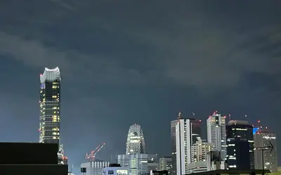 a city skyline at night with tall buildings at Spacious 2BR TownHouse, Central Shinjuku City in Tokyo