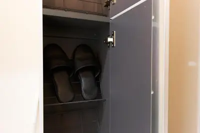 a pair of shoes sitting in a closet at Monthly Studio G2 in Tokyo