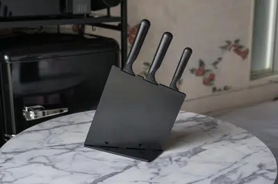 a knife block sitting on top of a table at Sakura RYOKAN MEJIRO2 in Tokyo