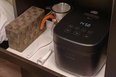 a coffee maker sitting on top of a shelf at \u30a2\u30f3\u30c9\u30b9\u30c6\u30a4\u5f25\u751f\u753a4\u4e01\u76ee201 in Tokyo