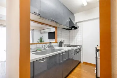a kitchen with a sink and a stove at -Belmazon meguro402- 7 minutes to Shibuya Station in Tokyo